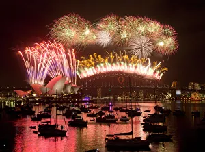 Fireworks light up the Sydney Harbour Bridge during the annual fireworks display to Fireworks light up the Sydney Harbour Bridge during the annual fireworks display to