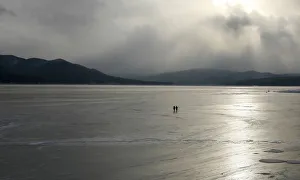 Fishermen walk along the frozen Yenisei River in the Taiga district outside Russia's Fishermen walk along the frozen Yenisei River in the Taiga district outside Russia's