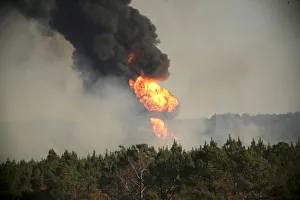 Flames shoot into the sky from a gas line explosion in western Shelby County Flames shoot into the sky from a gas line explosion in western Shelby County