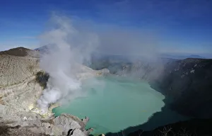 A general view of Kawah Ijen volcanic crater and the sulphur mines located at its foot A general view of Kawah Ijen volcanic crater and the sulphur mines located at its foot