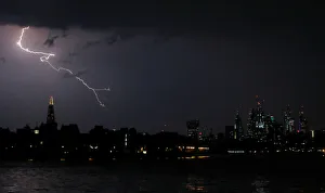 General view as lightning strikes over the city of London, Britain General view as lightning strikes over the city of London, Britain