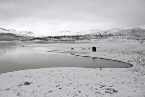 A general view of people visiting the snow-covered Hanna Lake after a snowfall A general view of people visiting the snow-covered Hanna Lake after a snowfall
