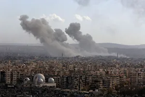 A general view shows rising smoke after strikes on Aleppo city A general view shows rising smoke after strikes on Aleppo city