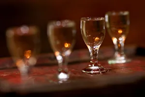 Glasses with Chinese spirit baijiu are seen on a bar top at the Capital Spirits Baijiu Glasses with Chinese spirit baijiu are seen on a bar top at the Capital Spirits Baijiu