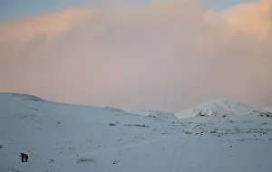 Hillwalkers descend Ben Vrackie during wintry weather near Pitlochry, Scotland Hillwalkers descend Ben Vrackie during wintry weather near Pitlochry, Scotland