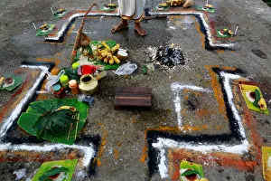 A Hindu man prays for his mother, who died 16 days ago, at a river side in Yangon A Hindu man prays for his mother, who died 16 days ago, at a river side in Yangon