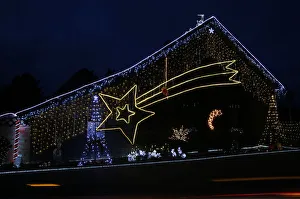 A house is decorated with a huge Star of Bethlehem in the village of Brueggen near A house is decorated with a huge Star of Bethlehem in the village of Brueggen near