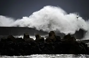 Huge waves crash on the San Esteban de Pravia seafront in the northern Spanish region of Huge waves crash on the San Esteban de Pravia seafront in the northern Spanish region of