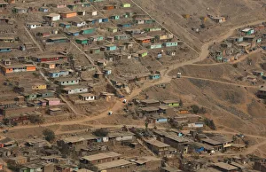 Huts and houses are seen on the hills of Nueva Esperanza ('New Hope Huts and houses are seen on the hills of Nueva Esperanza ('New Hope