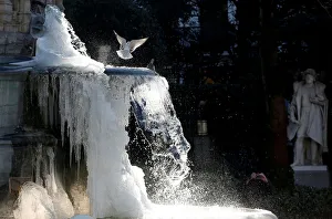 Ice partially covers a fountain on a cold winter day in central Brussels Ice partially covers a fountain on a cold winter day in central Brussels