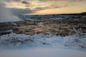 Kang Collection: Ice and snow cover areas near the brink of the Horseshoe Falls in Niagara Falls on the