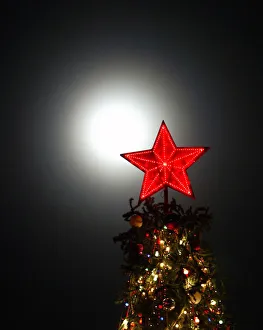 Illuminated red star sits atop Christmas tree in southern Russian city of Stavropol Illuminated red star sits atop Christmas tree in southern Russian city of Stavropol