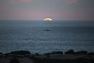 Israeli naval vessel sails near Kibbutz Zikim, just north of the Gaza Strip Israeli naval vessel sails near Kibbutz Zikim, just north of the Gaza Strip
