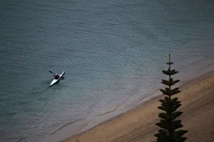 A kayaker paddles off Wellingtons Oriental Bay beach A kayaker paddles off Wellingtons Oriental Bay beach