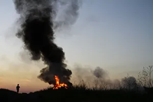Kosovo Serbs set a bonfire to celebrate the eve of First May Day or Labour Day in their Kosovo Serbs set a bonfire to celebrate the eve of First May Day or Labour Day in their