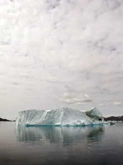 A large iceberg floats in a fjord near the south Greenland town of Narsaq A large iceberg floats in a fjord near the south Greenland town of Narsaq
