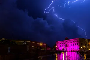 Lightning streaks are seen during a storm over the Auberge de Castille, the office Lightning streaks are seen during a storm over the Auberge de Castille, the office