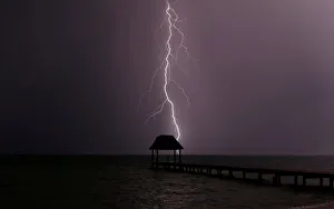 Lightning strikes the Caribbean as a thunderstorm passes Tankah Bay, near Tulum Lightning strikes the Caribbean as a thunderstorm passes Tankah Bay, near Tulum
