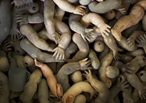 Limbs of dolls are shown as spare parts in a pile ready to be used in customers doll Limbs of dolls are shown as spare parts in a pile ready to be used in customers doll