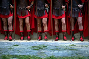 Locals dressed as Roman soldiers take part in a Via Crucis representation on Good Friday Locals dressed as Roman soldiers take part in a Via Crucis representation on Good Friday