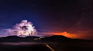 A long time exposure shows molten lava which flows from the Piton de la Fournaise A long time exposure shows molten lava which flows from the Piton de la Fournaise