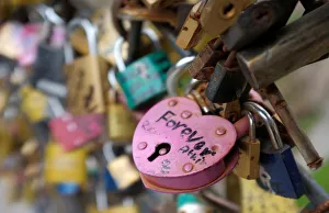 Love Locks are attached to an iron grill on a foot bridge at the historical part of Love Locks are attached to an iron grill on a foot bridge at the historical part of