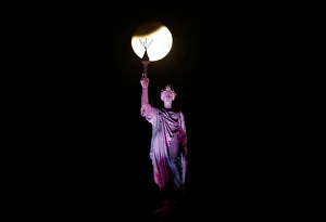 A lunar eclipse of a full Blue Moon is seen above a statue at the Chhatrapati Shivaji A lunar eclipse of a full Blue Moon is seen above a statue at the Chhatrapati Shivaji