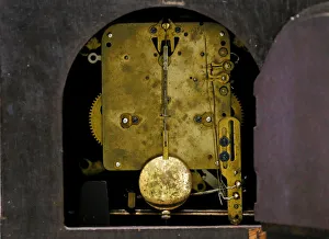 The machine of a classic wooden clock is seen at a workshop in Colombo The machine of a classic wooden clock is seen at a workshop in Colombo