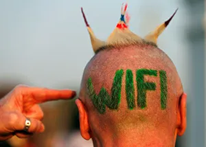 A man shows himself his hair style during ceremony known as Wai Kru to pay respects to A man shows himself his hair style during ceremony known as Wai Kru to pay respects to