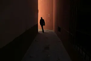 A man walks through the Santa Cruz neighbourhood in the Andalusian capital of Seville A man walks through the Santa Cruz neighbourhood in the Andalusian capital of Seville