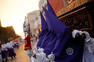 Men carry religious images during the Procession of Jesus Nazareno de Candelaria in the Men carry religious images during the Procession of Jesus Nazareno de Candelaria in the