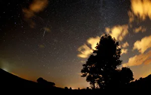 Meteors streak past stars in the night sky during the Perseid meteor shower in Premnitz Meteors streak past stars in the night sky during the Perseid meteor shower in Premnitz