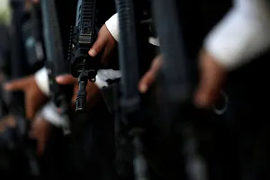Mexican state police hold Beretta ARX160 rifles as they stand in formation at the police Mexican state police hold Beretta ARX160 rifles as they stand in formation at the police