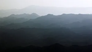 A morning fog rests over a mountain range in Afghanistans Paktiya Province A morning fog rests over a mountain range in Afghanistans Paktiya Province