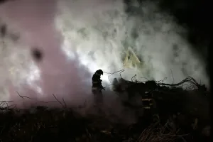 Firefighters at a collapsed building Print