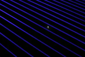 Total Lunar Eclipse Prints: The moon is seen during the beginning of a total lunar eclipse through the structures of