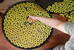 Palestinian man prepares traditional cakes for sale ahead of Muslim holiday of Eid al-Fitr Palestinian man prepares traditional cakes for sale ahead of Muslim holiday of Eid al-Fitr