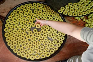 Palestinian man prepares traditional cakes for sale ahead of Muslim holiday of Eid al-Fitr Palestinian man prepares traditional cakes for sale ahead of Muslim holiday of Eid al-Fitr