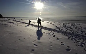 People enjoy sunny weather by the seaside in Saulkrasti People enjoy sunny weather by the seaside in Saulkrasti