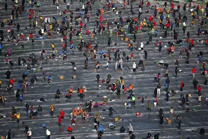 People fish for trout through holes in a frozen river in Hwacheon People fish for trout through holes in a frozen river in Hwacheon