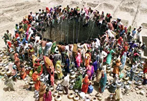 People Gather Around a Well People Gather Around a Well