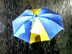 PEOPLE SHELTER UNDER UMBRELLAS AS TORRENTIAL RAIN FALLS IN LONDON PEOPLE SHELTER UNDER UMBRELLAS AS TORRENTIAL RAIN FALLS IN LONDON