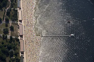 People sunbathe and swim at the beach of Wannsee near Berlin People sunbathe and swim at the beach of Wannsee near Berlin