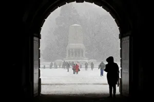 People walk in the snow on Horse Guards Parade in London People walk in the snow on Horse Guards Parade in London