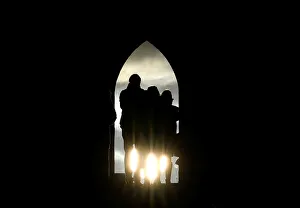 Revellers celebrate the Summer Solstice as the sun rises at Glastonbury Tor in Glastonbury Revellers celebrate the Summer Solstice as the sun rises at Glastonbury Tor in Glastonbury