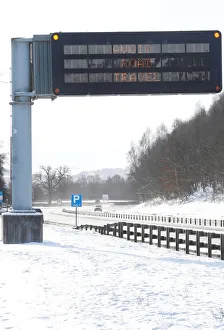 A road sign warns against driving in the snow near Perth, Scotland A road sign warns against driving in the snow near Perth, Scotland
