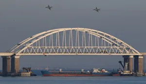 Russian jet fighters fly over a bridge connecting the Russian mainland with the Crimean Russian jet fighters fly over a bridge connecting the Russian mainland with the Crimean