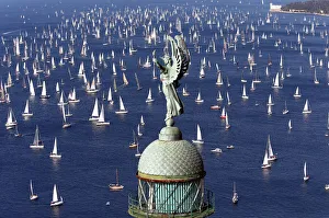 Sailing boats gather at the start of the Barcolana regatta in front of Trieste harbour Sailing boats gather at the start of the Barcolana regatta in front of Trieste harbour