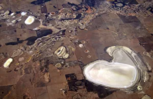 Salt pans and small dams can be seen in drought-effected farming areas located Salt pans and small dams can be seen in drought-effected farming areas located