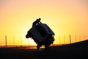 Saudi men perform a stunt known as sidewall skiing in Tabuk Saudi men perform a stunt known as sidewall skiing in Tabuk